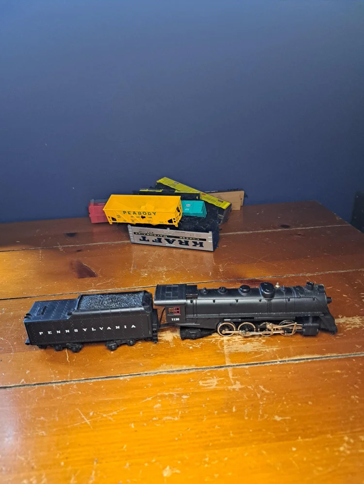 Vintage Train Set with Nine Cars, One Engine, Tracks and Control Box